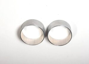 Bottom Aluminum fork sleeves (2) for early models provide hydraulic bump stop to eliminate bottom clunk.