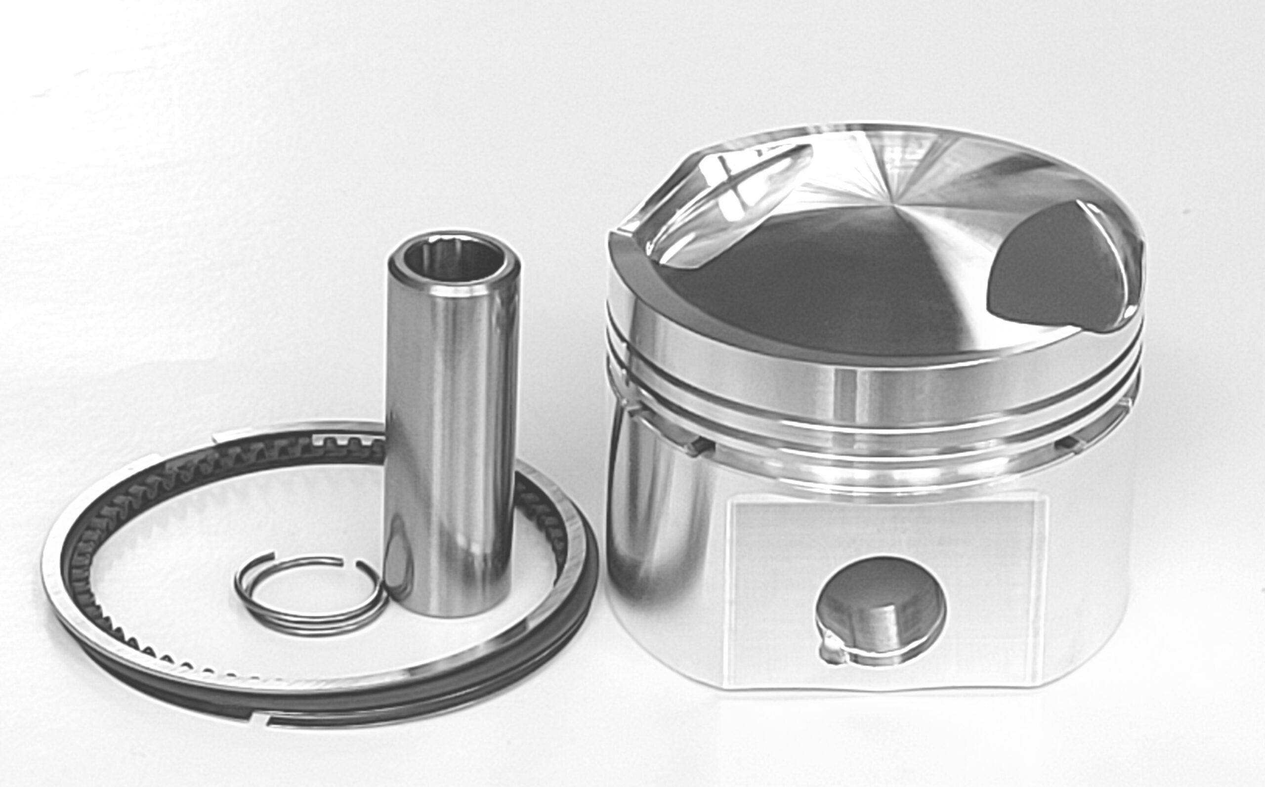 Complete set of two Norton Ultra Hi CR domed pistons 750 to 1007cc for stock Norton rods.  Some sizes in stock for $599 a pair